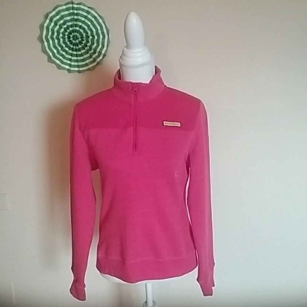 A pink fleece sweater